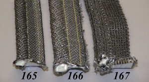 Black Graphite Impregnated Tadpole Gasket, 5/8" foil lined bulb x1.5" wide w/PSA- 1.5 wide x180'